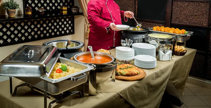 Eco-Friendly Chafing Fuel Gel burning cleanly under a commercial buffet dish